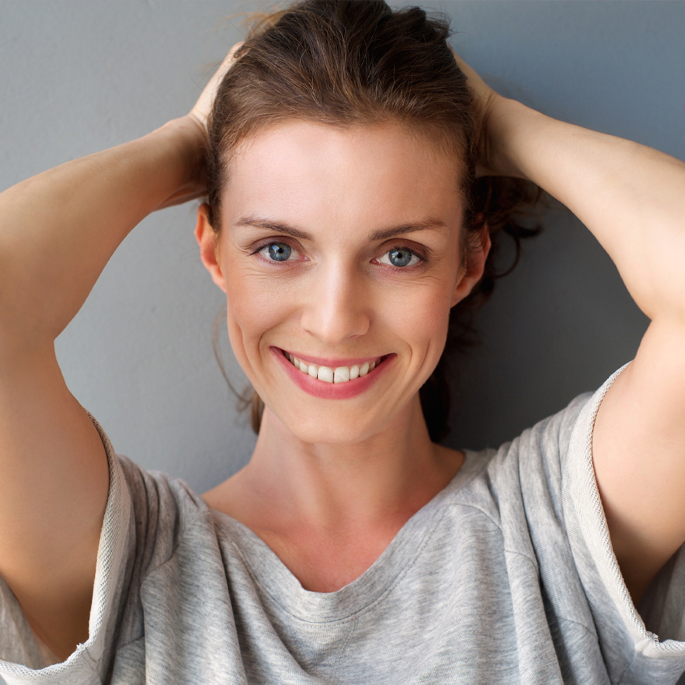 a woman smiling for the camera