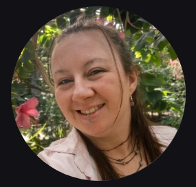a woman who is smiling and looking at the camera